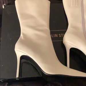 Winter White mid calf boots.